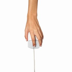 Close-up of female hand clicking on computer mouse
