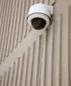 Close-up of security camera on exterior of building