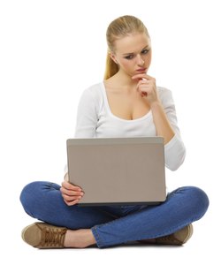 Worried girl with laptop