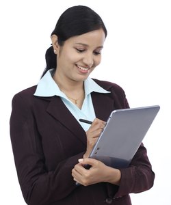 Young business woman with tablet and stylus