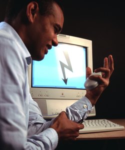 Businessman holding mouse checking nerves