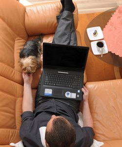 Businessman relaxing on sofaa