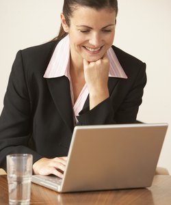 Woman working on laptop computer