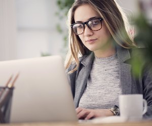 Working woman in computer