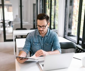 Handsome man working on a project.