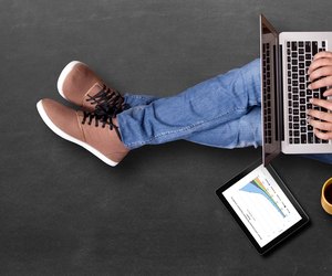 Global business growth graph analyzing with laptop