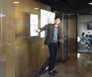 Creative professional with visual reference leading presentation