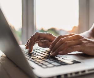 Businessman using laptop computer in the office