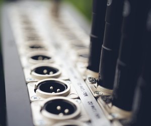 Series of connection xlr connector. Rear of sound control panel. Close up.