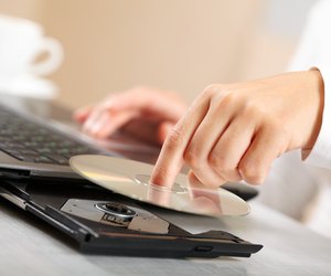 Woman hand with CD