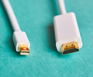 Closeup of HDMI and mini display port cables.