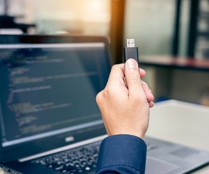 Developing programming and coding technologies on desk white