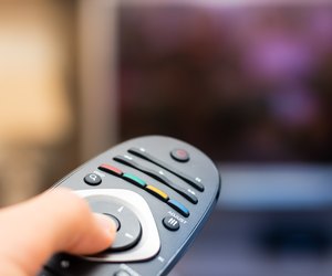 Watching TV and pressing remote controller in first person view