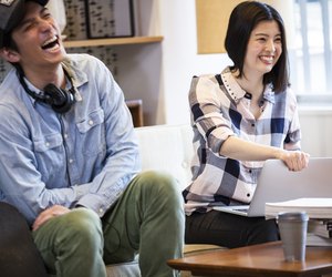 Casual discussion between coworkers at startup office