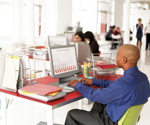 Businessman with data on computer