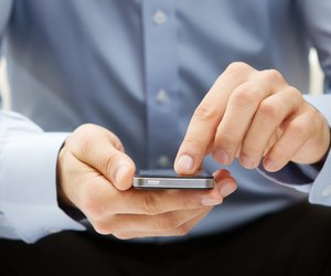Close up of a man using smart phone