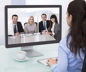 Businesswoman Watching Video Conference
