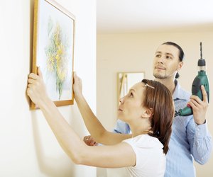 serious couple choosing place for picture