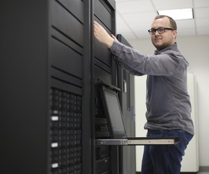 Technician working on a server