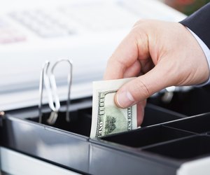 Hand With Dollar Notes