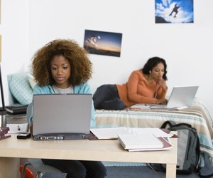 Women using laptop computers