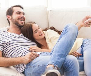 Cute couple relaxing on couch