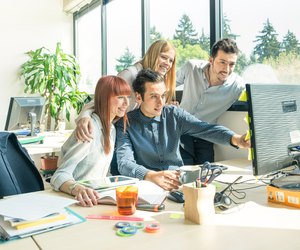 Young business people employee with computer at start up improvement