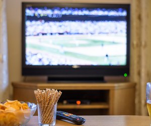 Television, TV watching (baseball match) with snacks and alcohol