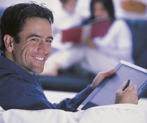 Man using tablet computer