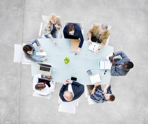 Group Of Business People at Meeting Table