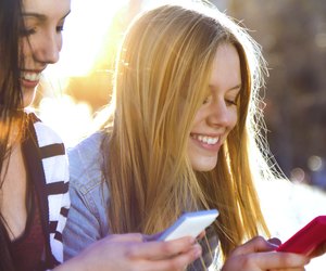 friends chatting with their smartphones