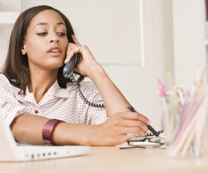 Businesswoman on telephone in office
