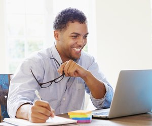 Businessman Working In Office At Home