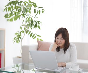 Mature woman using laptop