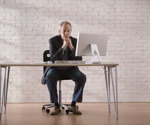 Businessman at desk with computer