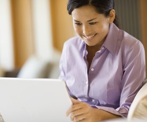 Woman working on laptop computer
