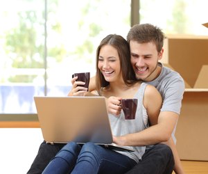 Couple buying online and moving house