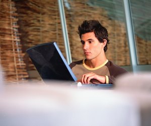 Young man working with a laptop