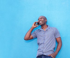 Modern african man talking on cell phone