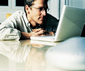 Businessman Working on his Laptop