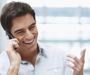Young handsome guy enjoying a telephonic conversation