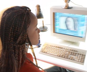 Businesswoman with headset and computer