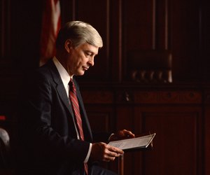 Lawyer reading paperwork