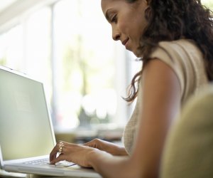 Woman Using Laptop