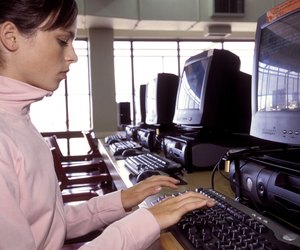Girl doing schoolwork on computer