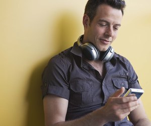 Man with digital music player