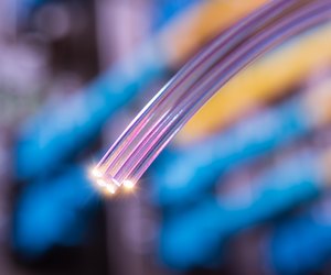 optical fibres dinamic flying from deep on technology background