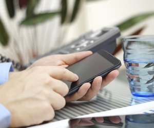 businessman is talking on phone, working with smart phone