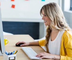 Beautiful woman working on computer