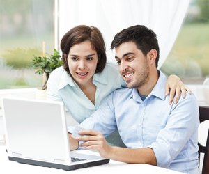 Happy couple shopping online